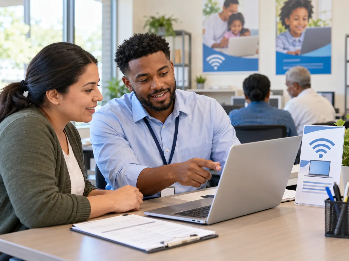 Household using a laptop and home Wi-Fi while comparing low-income internet options